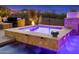 Unwind in the hot tub with integrated water features, offering a private retreat with hill views at 11796 W Creosote Dr, Peoria, AZ 85383
