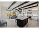 Open concept kitchen featuring a large island and dining area at 11796 W Creosote Dr, Peoria, AZ 85383