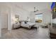 Bright, airy main bedroom with a tray ceiling and lots of natural light at 11796 W Creosote Dr, Peoria, AZ 85383
