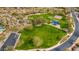 Community park featuring a playground, basketball court and lush landscaping offering residents space for recreation and relaxation at 11796 W Creosote Dr, Peoria, AZ 85383