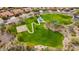Aerial view of a beautifully maintained community park, perfect for outdoor recreation and relaxation for all ages at 11796 W Creosote Dr, Peoria, AZ 85383