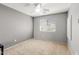 Cozy bedroom with neutral carpet, ceiling fan, and a window with blinds at 1204 S Arroya Cir, Mesa, AZ 85206