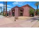 Commercial building featuring desert-style landscaping, and clear signage enhancing curb appeal at 15971 W Indigo Ln, Surprise, AZ 85374