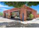 Charming building exterior showcasing ample windows and a well-maintained facade in a commercial setting at 15971 W Indigo Ln, Surprise, AZ 85374