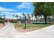 Lawn bowling and bocce ball courts add recreational fun to this meticulously landscaped property at 15971 W Indigo Ln, Surprise, AZ 85374