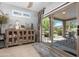 Comfortable living area with sliding glass doors to an outdoor seating area at 15971 W Indigo Ln, Surprise, AZ 85374