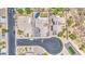 Overview of houses with pools, well manicured yards and cul-de-sac street at 1853 N Rowen Cir, Mesa, AZ 85207