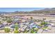 Community featuring houses with pools and well-maintained yards with highway access at 1853 N Rowen Cir, Mesa, AZ 85207