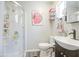 Modern bathroom featuring a sleek vanity, updated fixtures, and a glass-enclosed shower at 1853 N Rowen Cir, Mesa, AZ 85207