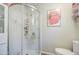 Modern bathroom with updated fixtures, bright lighting, and a glass-enclosed shower stall at 1853 N Rowen Cir, Mesa, AZ 85207