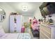 Large bedroom with natural light, nice floors, and comfortable layout has great potential at 1853 N Rowen Cir, Mesa, AZ 85207