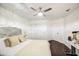 Bedroom with dark wood floors and silvery accents and bed at 1853 N Rowen Cir, Mesa, AZ 85207