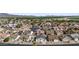 A landscape aerial view of the houses and roads in the neighborhood at 1881 E Kerby Farms Rd, Chandler, AZ 85249