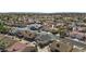 An aerial view of a neighborhood street featuring desert landscaping at 1881 E Kerby Farms Rd, Chandler, AZ 85249
