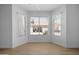 Bright dining area featuring a large window with views of the outdoor patio at 1881 E Kerby Farms Rd, Chandler, AZ 85249