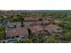 Neighborhood aerial view showcasing manicured landscaping, private pools, and scenic mountain views at 1935 E Seminole Dr, Phoenix, AZ 85022