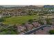 Beautiful neighborhood aerial view of homes near a green space, lush landscaping and mountain views at 1935 E Seminole Dr, Phoenix, AZ 85022