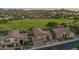 Neighborhood aerial view featuring lush green spaces, mature trees, and desert landscaping at 1935 E Seminole Dr, Phoenix, AZ 85022