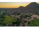 Community aerial view showcasing playground, park and mountain backdrop at 1935 E Seminole Dr, Phoenix, AZ 85022