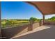A charming terrace provides views of a lush golf course, enhancing outdoor enjoyment at 1935 E Seminole Dr, Phoenix, AZ 85022