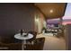 Cozy covered balcony with outdoor seating, and scenic views at sunset at 1935 E Seminole Dr, Phoenix, AZ 85022