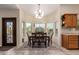 Bright dining area features modern lighting, neutral colors, and a beautiful rug at 1935 E Seminole Dr, Phoenix, AZ 85022