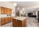 Bright kitchen features an island, ample storage, and easy access to other living spaces at 1935 E Seminole Dr, Phoenix, AZ 85022