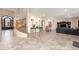 Open floor plan showcases staircase, neutral color palette, and tile flooring at 1935 E Seminole Dr, Phoenix, AZ 85022