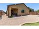 Backyard with gravel, artificial turf, and covered patio is perfect for entertaining at 226 E Monza Way, San Tan Valley, AZ 85140