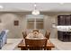 Dining area with natural light, a wooden table, and neutral colored walls at 226 E Monza Way, San Tan Valley, AZ 85140