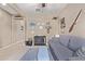 Cozy living room with a comfortable sofa, airplane décor, and neutral color palette at 226 E Monza Way, San Tan Valley, AZ 85140