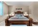 Cozy main bedroom with a decorative headboard, matching lamps, and soft bedding at 226 E Monza Way, San Tan Valley, AZ 85140