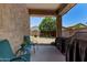 Covered patio offers an inviting outdoor space with seating and barbeque grills, perfect for entertaining and relaxing at 226 E Monza Way, San Tan Valley, AZ 85140