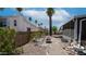 Gravel backyard with seating and lush greenery at 2400 E Baseline Ave # 44, Apache Junction, AZ 85119