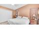 Bedroom with an attached closet, a large bed, and neutral color walls at 2400 E Baseline Ave # 44, Apache Junction, AZ 85119