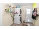 Bright laundry room with stacked washer and dryer units at 2400 E Baseline Ave # 44, Apache Junction, AZ 85119