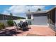 Patio with outdoor seating and well-maintained brickwork at 2400 E Baseline Ave # 44, Apache Junction, AZ 85119