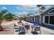 Relaxing outdoor patio features comfortable seating, a fire pit, and scenic views of the surrounding landscape at 2400 E Baseline Ave # 44, Apache Junction, AZ 85119