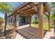 Inviting backyard with a covered patio and lush greenery, perfect for outdoor entertaining at 29007 N 120Th Dr, Peoria, AZ 85383