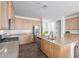 Kitchen with stainless steel appliances, granite countertops, and maple wood cabinets at 29007 N 120Th Dr, Peoria, AZ 85383