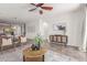 Stylish living room featuring tile floors, neutral walls, and carefully curated décor and furnishings at 29007 N 120Th Dr, Peoria, AZ 85383