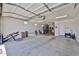 Spacious three car garage offering plenty of storage and room for your vehicles and hobbies at 29408 N 224Th Dr, Wittmann, AZ 85361