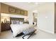Cozy bedroom with a comfortable bed, matching nightstands, and easy access to bathroom at 37795 W Padilla St, Maricopa, AZ 85138