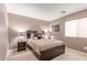 Comfortable bedroom with a queen-sized bed and two nightstands at 41448 N Eliana Dr, Queen Creek, AZ 85140