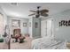 Inviting bedroom with a chair and ceiling fan at 41448 N Eliana Dr, Queen Creek, AZ 85140