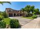 Beautiful home with a three-car garage, mature landscaping, and a spacious driveway at 41448 N Eliana Dr, Queen Creek, AZ 85140