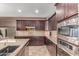 Well-equipped kitchen with modern appliances, granite countertops, and ample cabinet space at 41448 N Eliana Dr, Queen Creek, AZ 85140