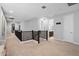 Bright upstairs hallway featuring neutral walls, carpeted floors, a dark railing and lots of natural light at 4615 E Navigator Ln, Phoenix, AZ 85050
