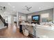 Open living space showcasing hardwood floors, stylish furniture, and easy access to the dining area at 4615 E Navigator Ln, Phoenix, AZ 85050