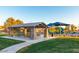 Community playground features picnic tables and shade structures at 4615 E Navigator Ln, Phoenix, AZ 85050